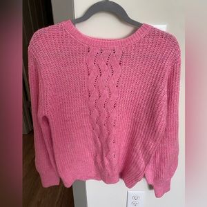 Francesca’s pink sweater
